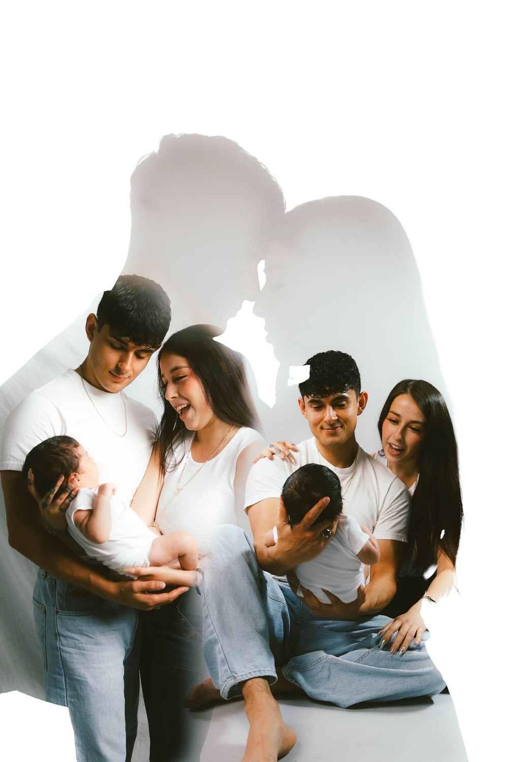 Family in white shirts on a white backdrop